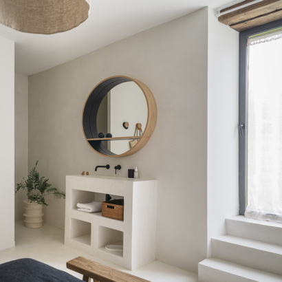 coin salle d'eau semi-ouverte chambre à coucher suite parentale meuble sur-mesure béton brossé miroir-console bois massif
